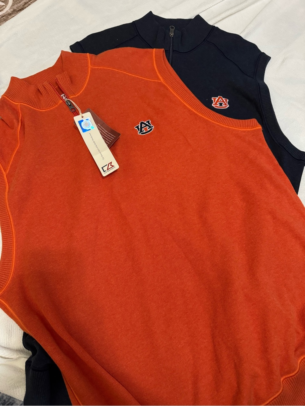 Duo of Auburn Cutter & Buck Orange & Navy Knit Zip Vest